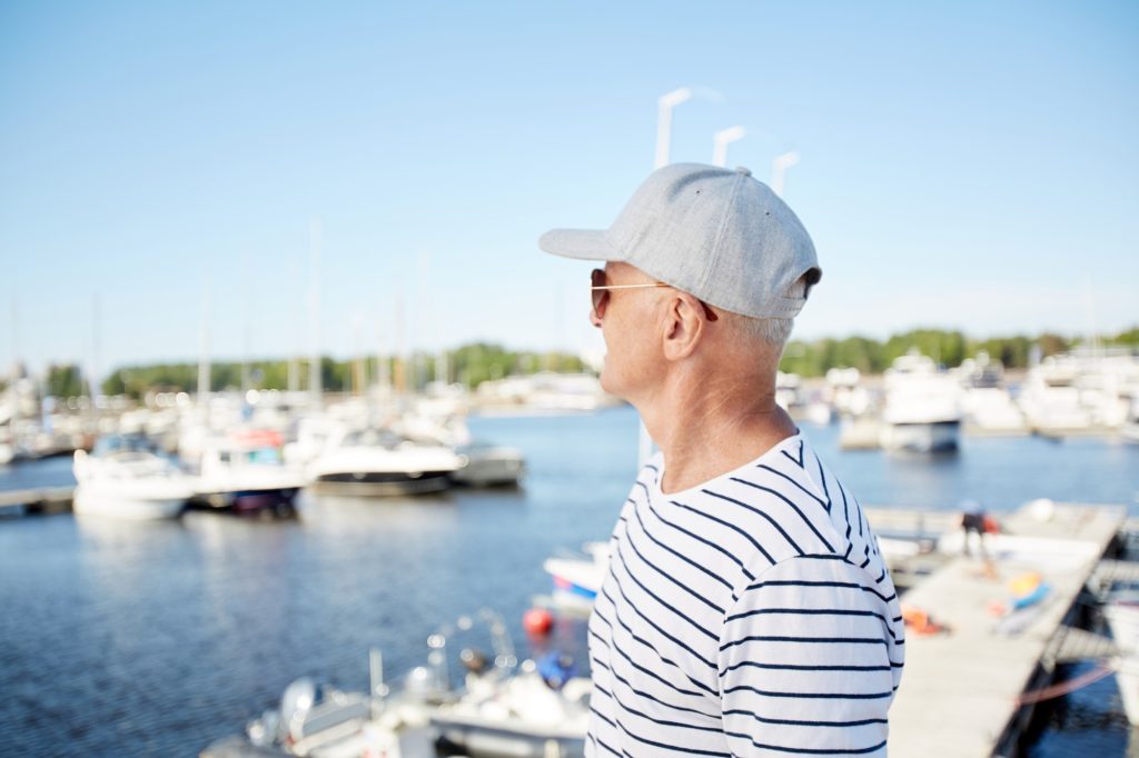 Mature man on vacation in yacht club